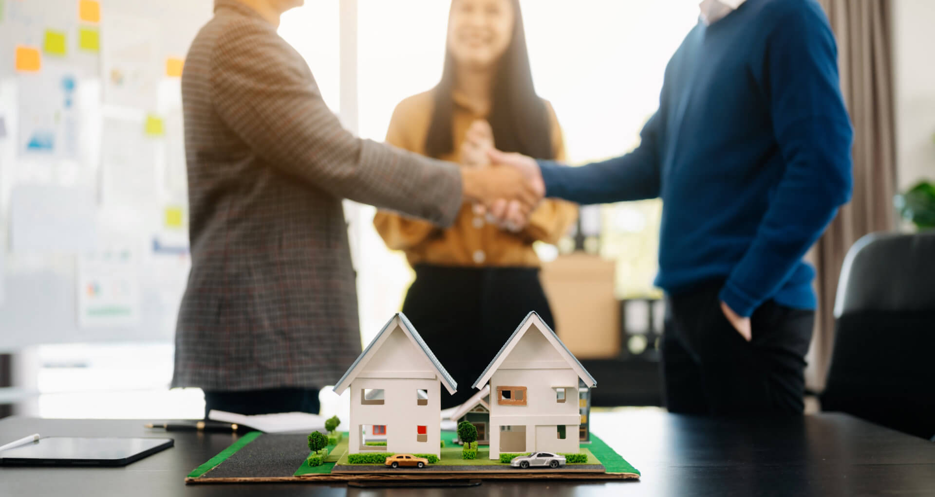 realtor and customer having handshake