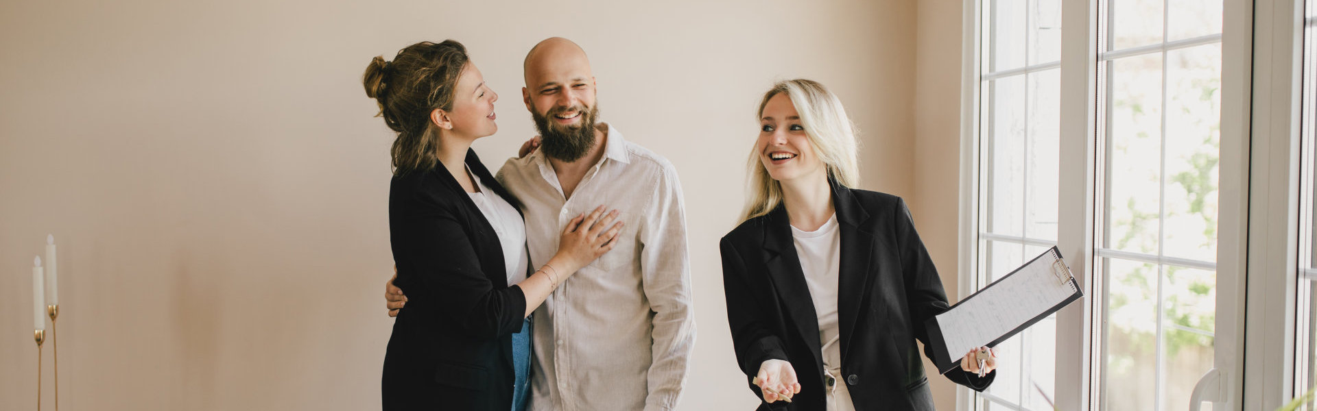couple and realtor having a conversation