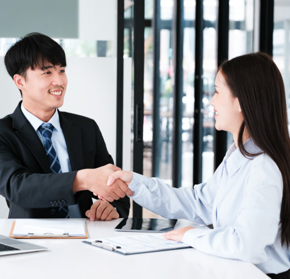 Agent and Customer Shaking Hands